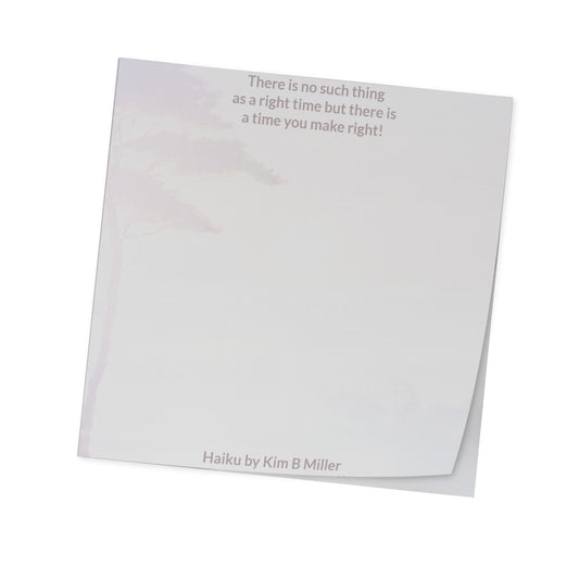 A pad of white sticky notes with a silhouette of a tree and a haiku poem  by Kim B Miller.